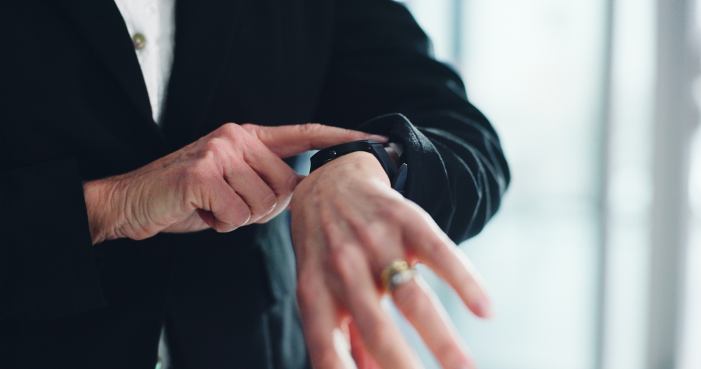 Man looking at his watch
